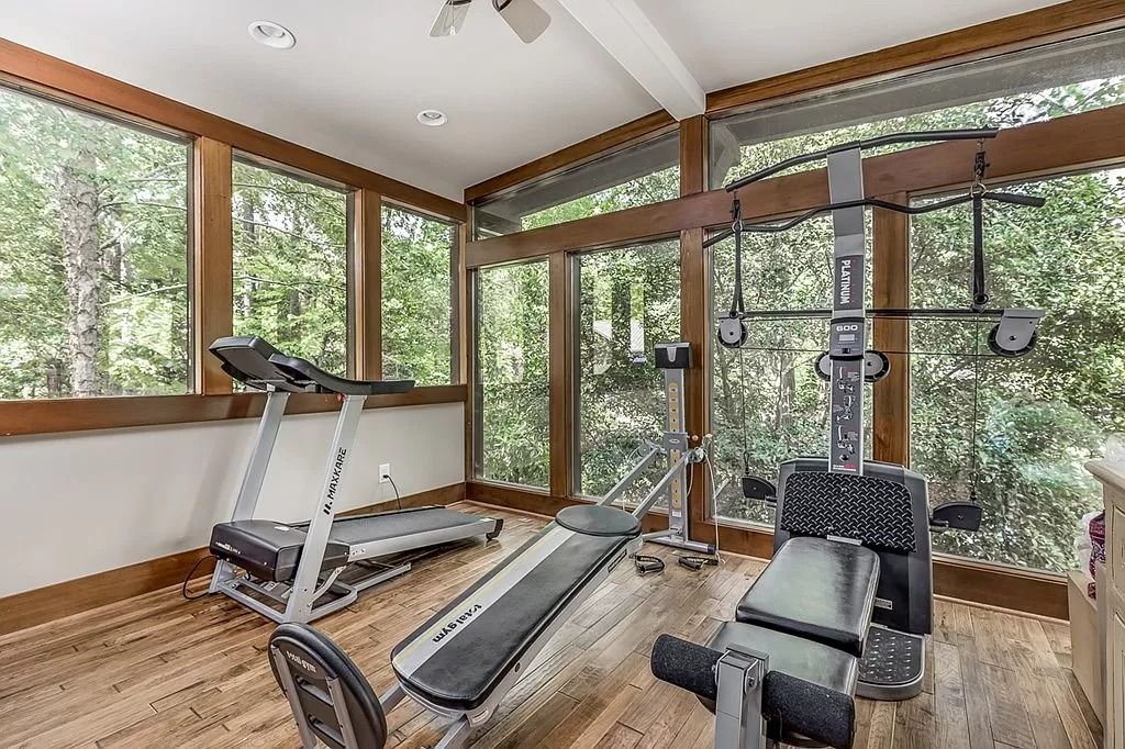 The Home in Columbus is a luxurious home with spectacular water views from almost every room, now available for sale. This home located at 6045 Round Hill Ct, Columbus, Georgia