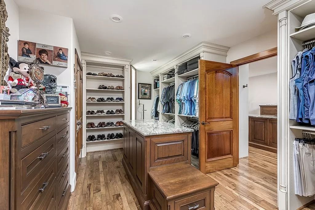 The Home in Columbus is a luxurious home with spectacular water views from almost every room, now available for sale. This home located at 6045 Round Hill Ct, Columbus, Georgia