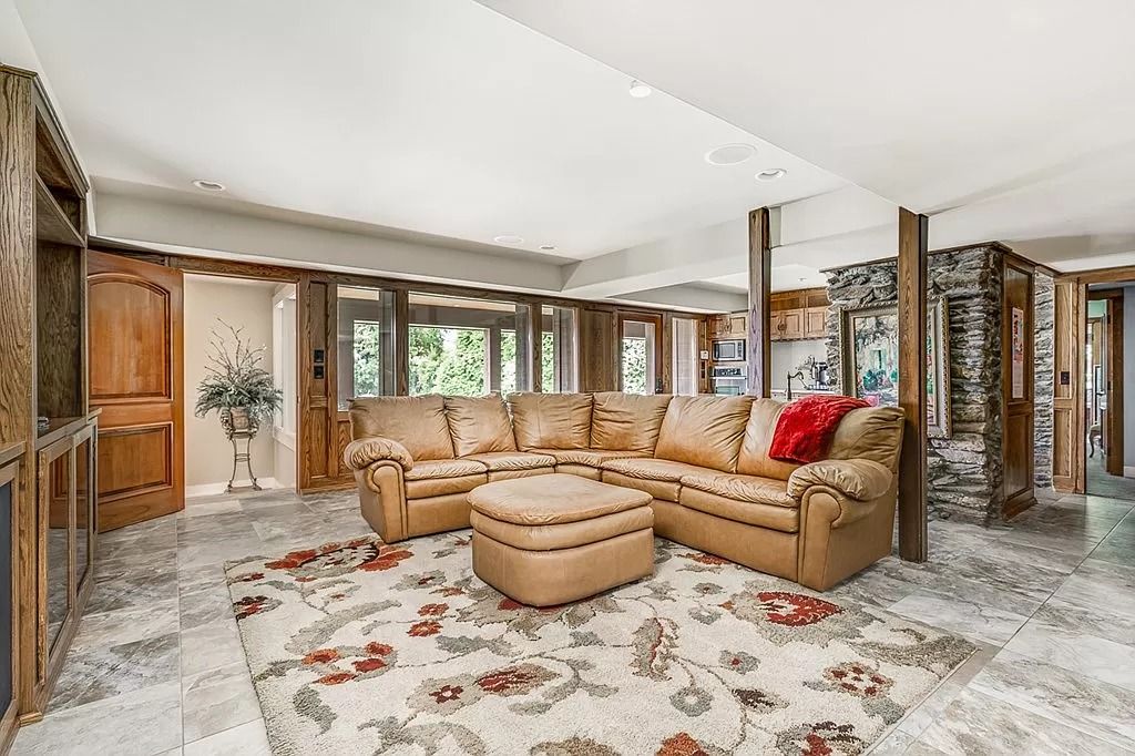 The Home in Columbus is a luxurious home with spectacular water views from almost every room, now available for sale. This home located at 6045 Round Hill Ct, Columbus, Georgia