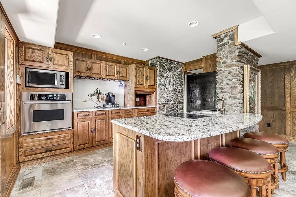 The Home in Columbus is a luxurious home with spectacular water views from almost every room, now available for sale. This home located at 6045 Round Hill Ct, Columbus, Georgia