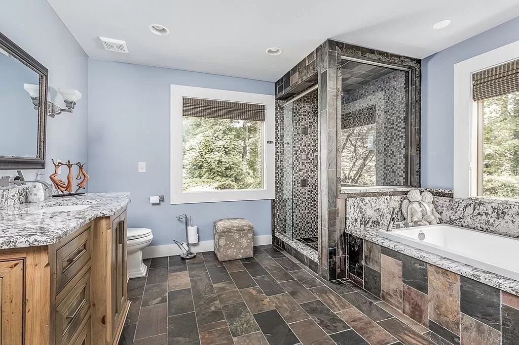 The Home in Columbus is a luxurious home with spectacular water views from almost every room, now available for sale. This home located at 6045 Round Hill Ct, Columbus, Georgia