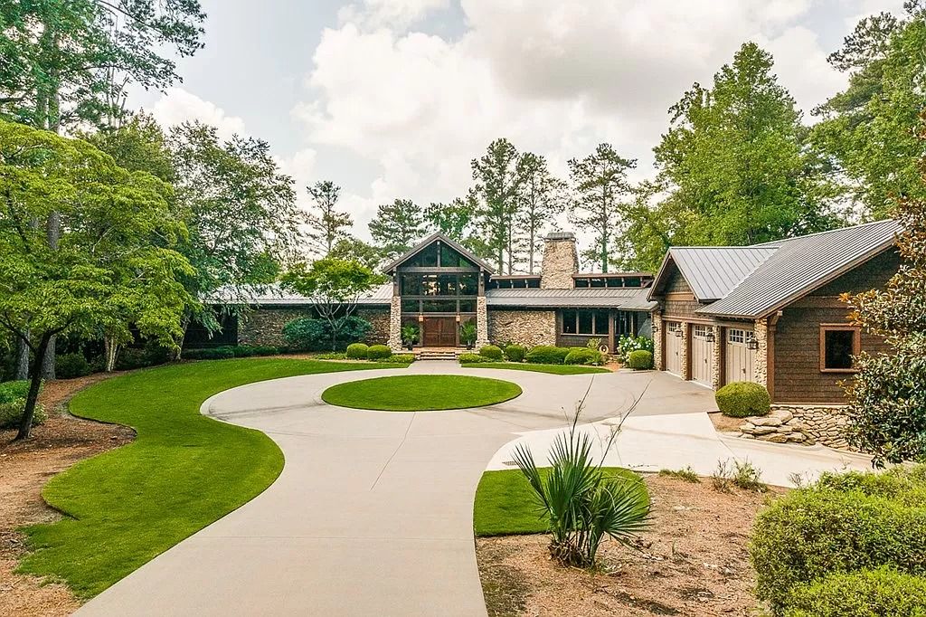 The Home in Columbus is a luxurious home with spectacular water views from almost every room, now available for sale. This home located at 6045 Round Hill Ct, Columbus, Georgia