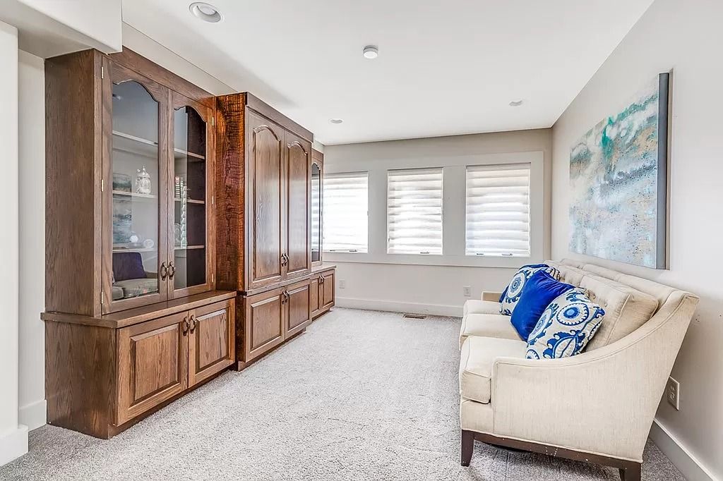 The Home in Columbus is a luxurious home with spectacular water views from almost every room, now available for sale. This home located at 6045 Round Hill Ct, Columbus, Georgia