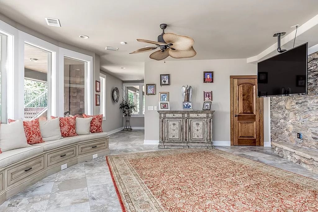 The Home in Columbus is a luxurious home with spectacular water views from almost every room, now available for sale. This home located at 6045 Round Hill Ct, Columbus, Georgia