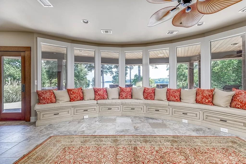 The Home in Columbus is a luxurious home with spectacular water views from almost every room, now available for sale. This home located at 6045 Round Hill Ct, Columbus, Georgia