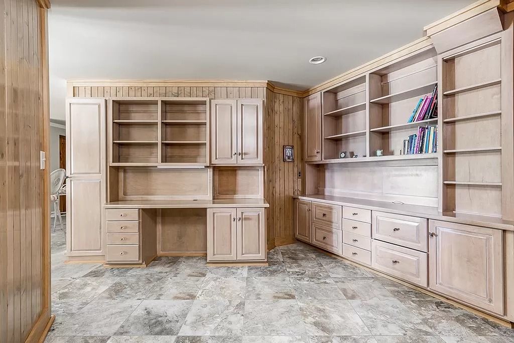 The Home in Columbus is a luxurious home with spectacular water views from almost every room, now available for sale. This home located at 6045 Round Hill Ct, Columbus, Georgia