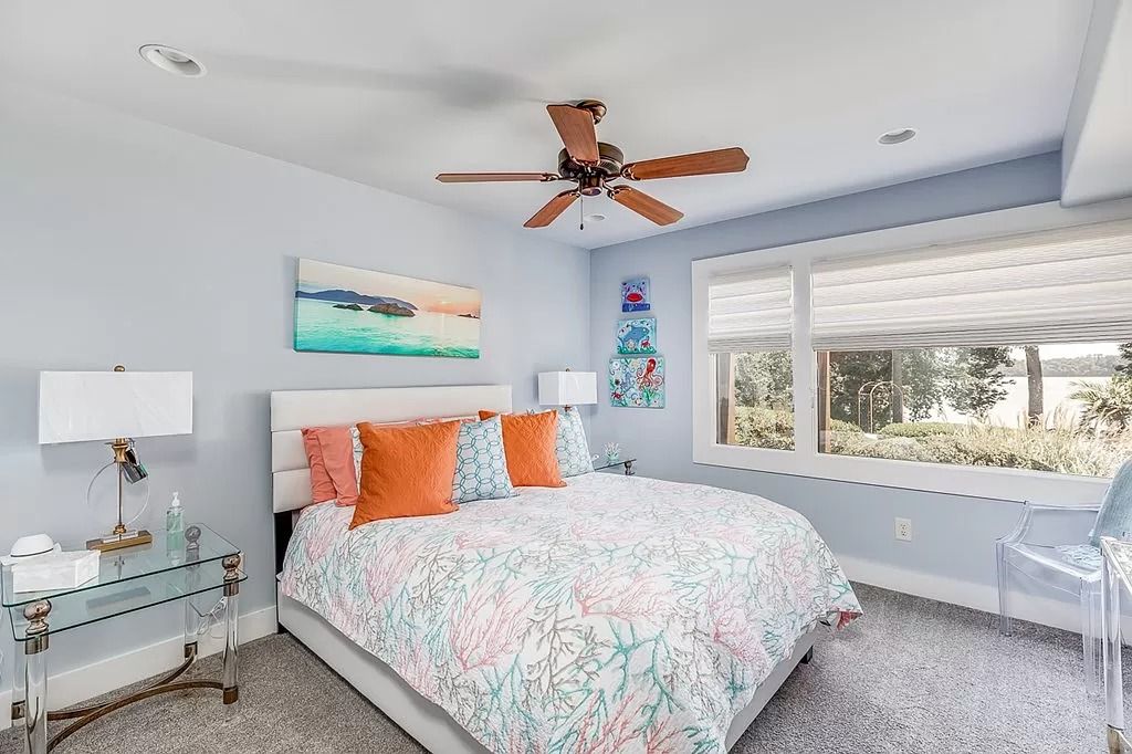 The Home in Columbus is a luxurious home with spectacular water views from almost every room, now available for sale. This home located at 6045 Round Hill Ct, Columbus, Georgia