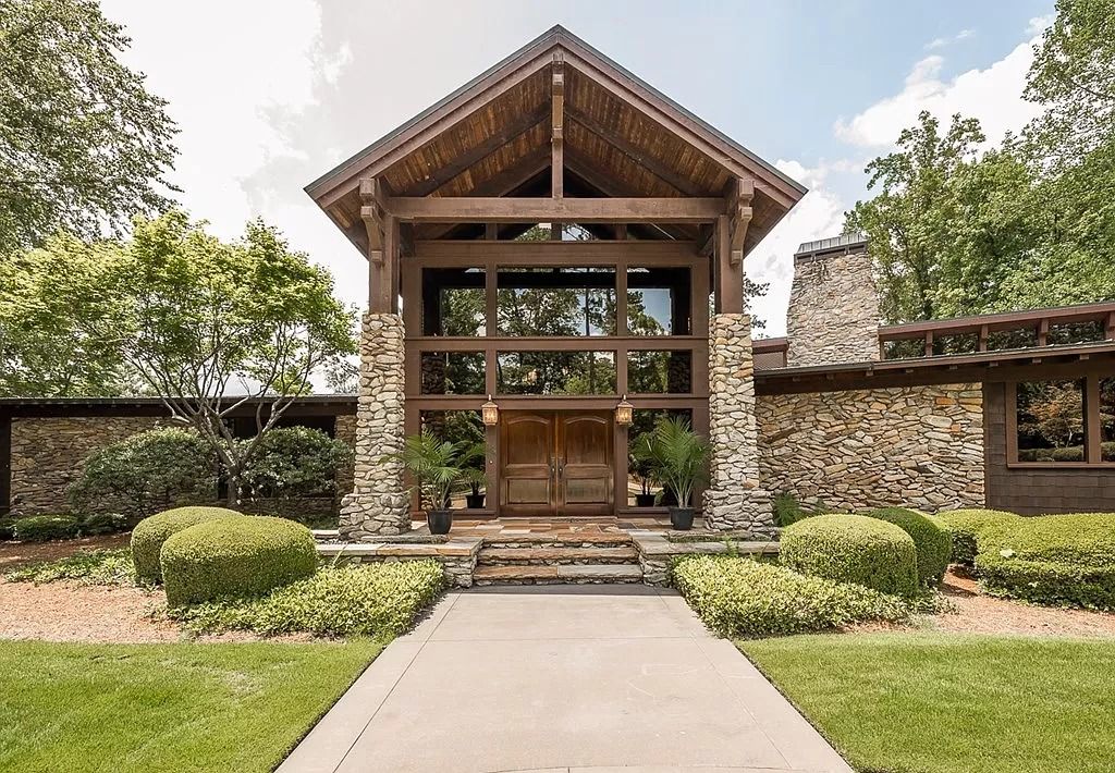 The Home in Columbus is a luxurious home with spectacular water views from almost every room, now available for sale. This home located at 6045 Round Hill Ct, Columbus, Georgia