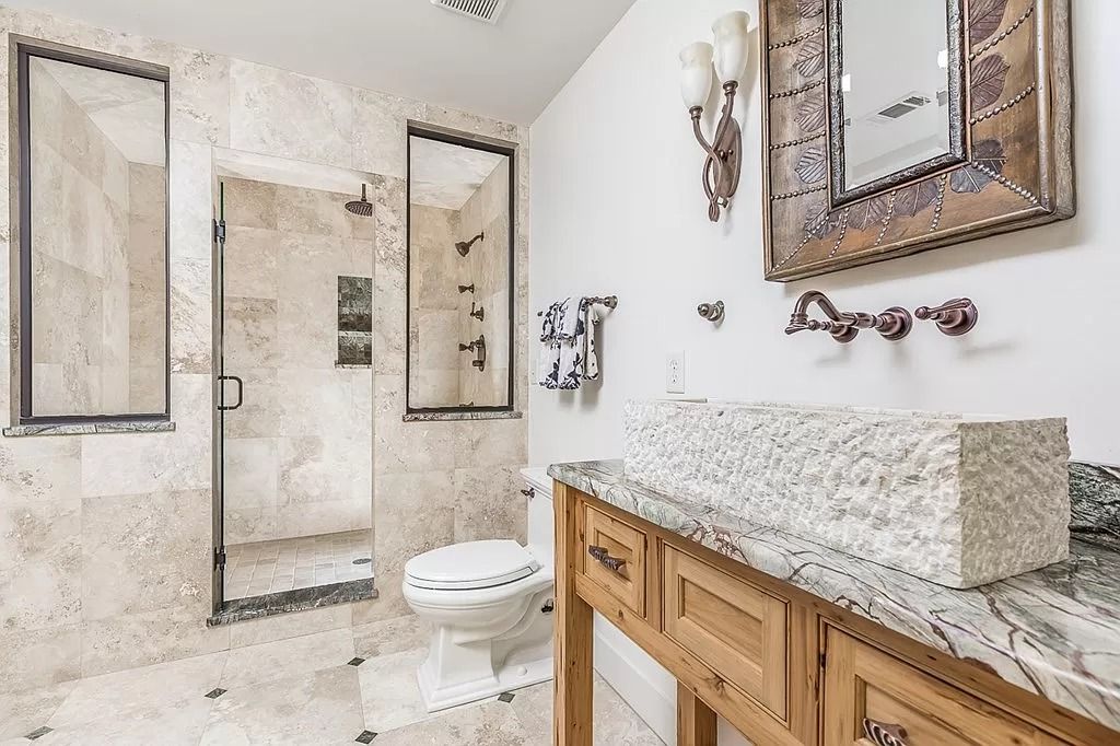 The Home in Columbus is a luxurious home with spectacular water views from almost every room, now available for sale. This home located at 6045 Round Hill Ct, Columbus, Georgia