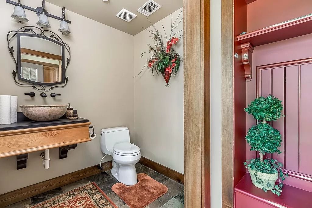 The Home in Columbus is a luxurious home with spectacular water views from almost every room, now available for sale. This home located at 6045 Round Hill Ct, Columbus, Georgia