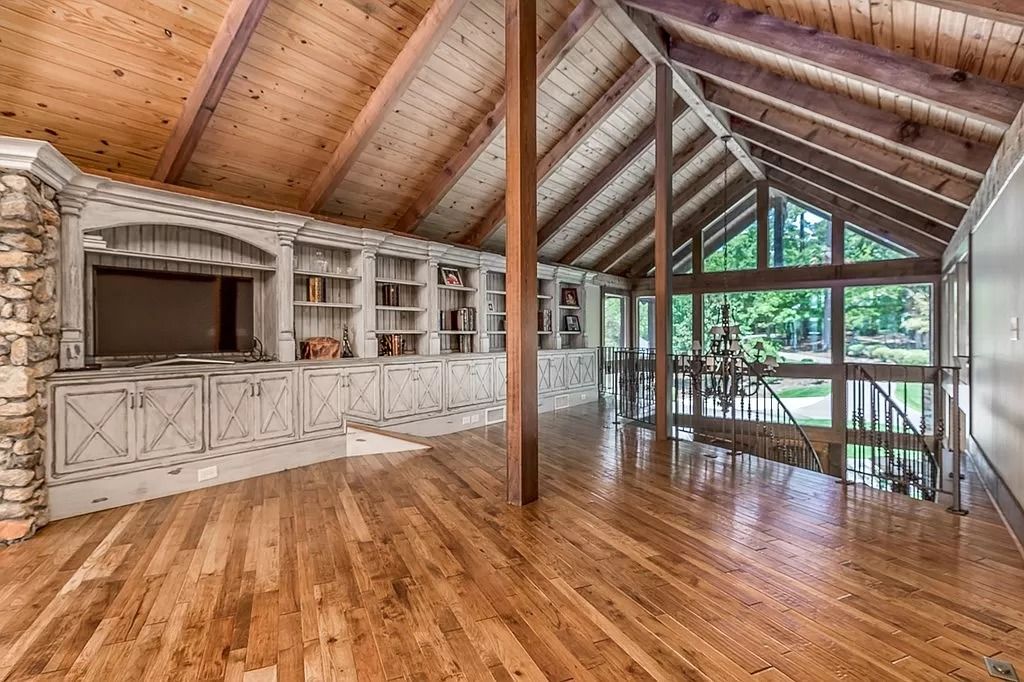 The Home in Columbus is a luxurious home with spectacular water views from almost every room, now available for sale. This home located at 6045 Round Hill Ct, Columbus, Georgia