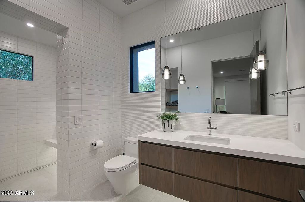 The Scottsdale Home, a contemporary property in Desert Mountain completed in 2020 by Blackstone Homes with interiors done by Ownby Design is now available for sale. This home located at 40050 N 107th St, Scottsdale, Arizona