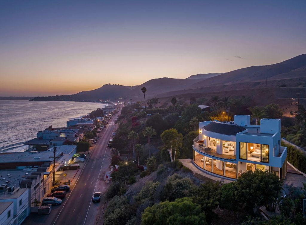 The Home in Malibu, a divine modern retreat with open-plan living spaces and entertainment-ready outdoor space offering far-reaching ocean views plus seamless access to local conveniences is now available for sale. This home located at 25225 Malibu Rd, Malibu, California