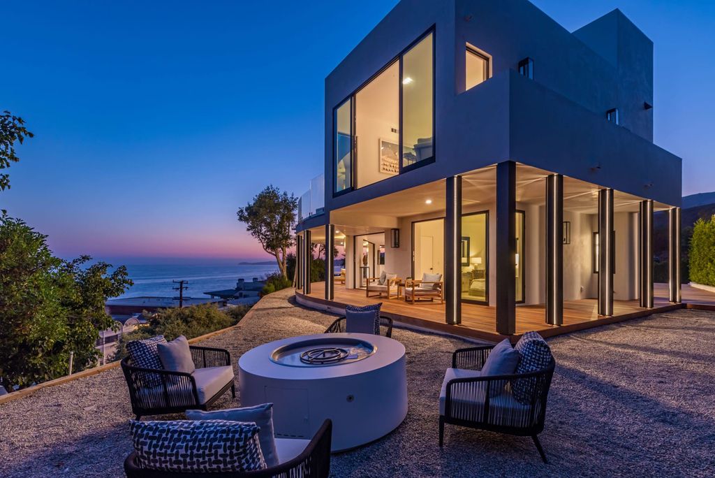 The Home in Malibu, a divine modern retreat with open-plan living spaces and entertainment-ready outdoor space offering far-reaching ocean views plus seamless access to local conveniences is now available for sale. This home located at 25225 Malibu Rd, Malibu, California