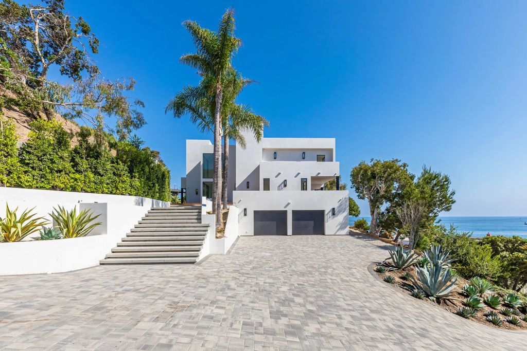The Home in Malibu, a divine modern retreat with open-plan living spaces and entertainment-ready outdoor space offering far-reaching ocean views plus seamless access to local conveniences is now available for sale. This home located at 25225 Malibu Rd, Malibu, California