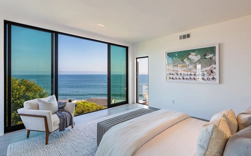 The Home in Malibu, a divine modern retreat with open-plan living spaces and entertainment-ready outdoor space offering far-reaching ocean views plus seamless access to local conveniences is now available for sale. This home located at 25225 Malibu Rd, Malibu, California