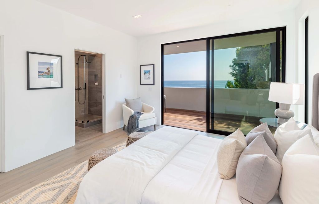 The Home in Malibu, a divine modern retreat with open-plan living spaces and entertainment-ready outdoor space offering far-reaching ocean views plus seamless access to local conveniences is now available for sale. This home located at 25225 Malibu Rd, Malibu, California