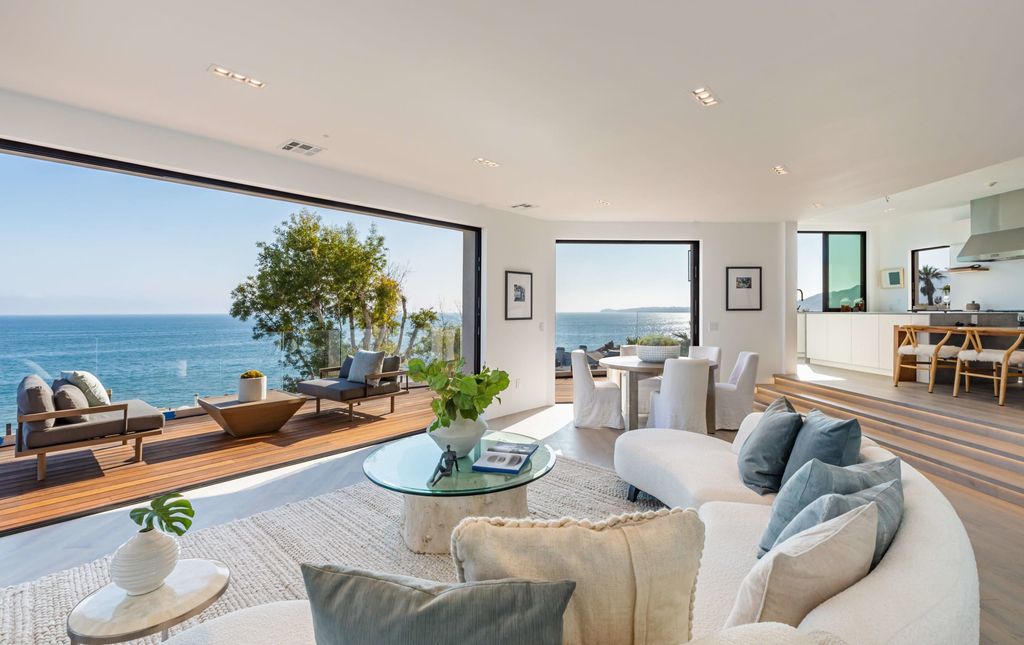 The Home in Malibu, a divine modern retreat with open-plan living spaces and entertainment-ready outdoor space offering far-reaching ocean views plus seamless access to local conveniences is now available for sale. This home located at 25225 Malibu Rd, Malibu, California