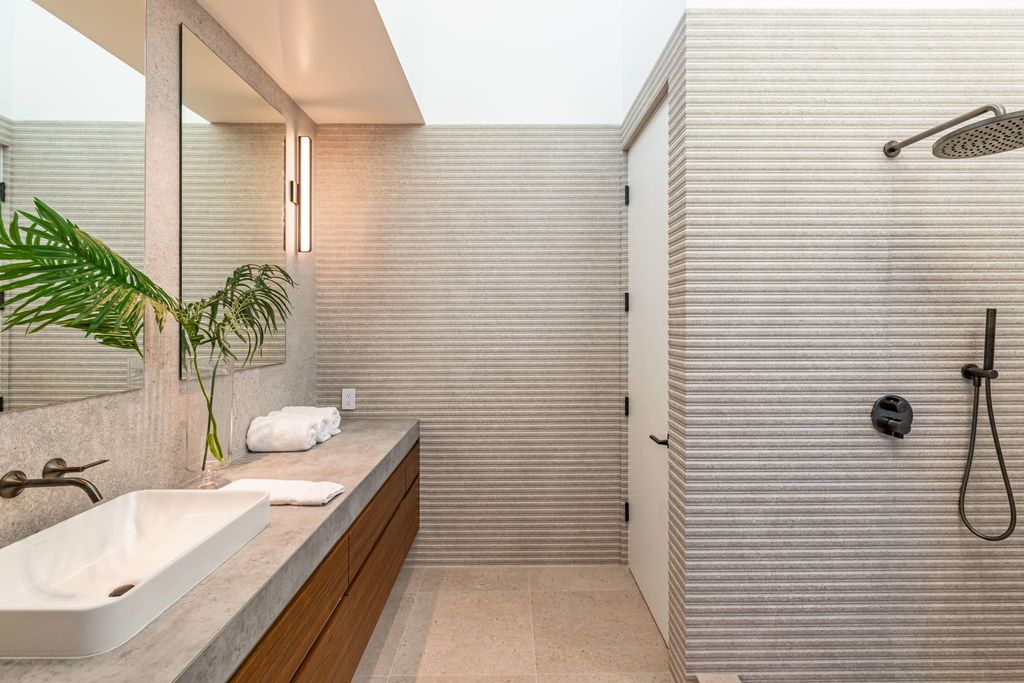 The Home in Malibu, a divine modern retreat with open-plan living spaces and entertainment-ready outdoor space offering far-reaching ocean views plus seamless access to local conveniences is now available for sale. This home located at 25225 Malibu Rd, Malibu, California