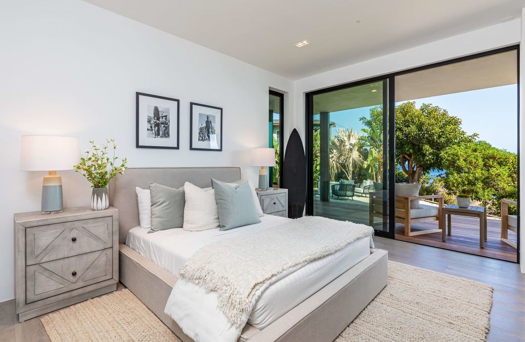 The Home in Malibu, a divine modern retreat with open-plan living spaces and entertainment-ready outdoor space offering far-reaching ocean views plus seamless access to local conveniences is now available for sale. This home located at 25225 Malibu Rd, Malibu, California