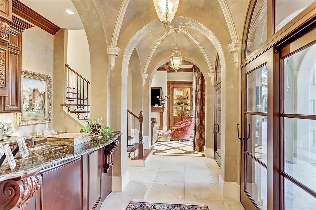 The Home in Sugar Land, a world class architectural masterpiece inspired by Europe's great estates offers endless lifestyle with opulent formals for entertaining, a gorgeous kitchen, wellness gym, two game rooms, wet bars, media room and other entertainment amenities is now available for sale. This home located at 11 Paradise Point Dr, Sugar Land, Texas