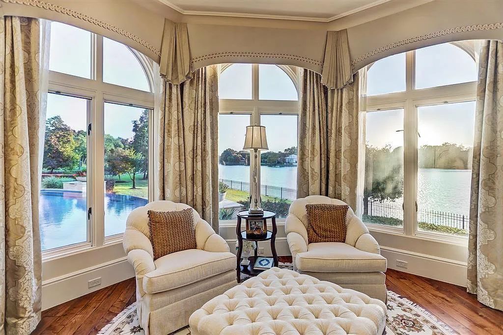 The Home in Sugar Land, a world class architectural masterpiece inspired by Europe's great estates offers endless lifestyle with opulent formals for entertaining, a gorgeous kitchen, wellness gym, two game rooms, wet bars, media room and other entertainment amenities is now available for sale. This home located at 11 Paradise Point Dr, Sugar Land, Texas