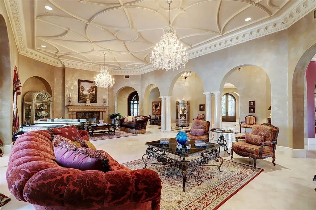 The Home in Sugar Land, a world class architectural masterpiece inspired by Europe's great estates offers endless lifestyle with opulent formals for entertaining, a gorgeous kitchen, wellness gym, two game rooms, wet bars, media room and other entertainment amenities is now available for sale. This home located at 11 Paradise Point Dr, Sugar Land, Texas