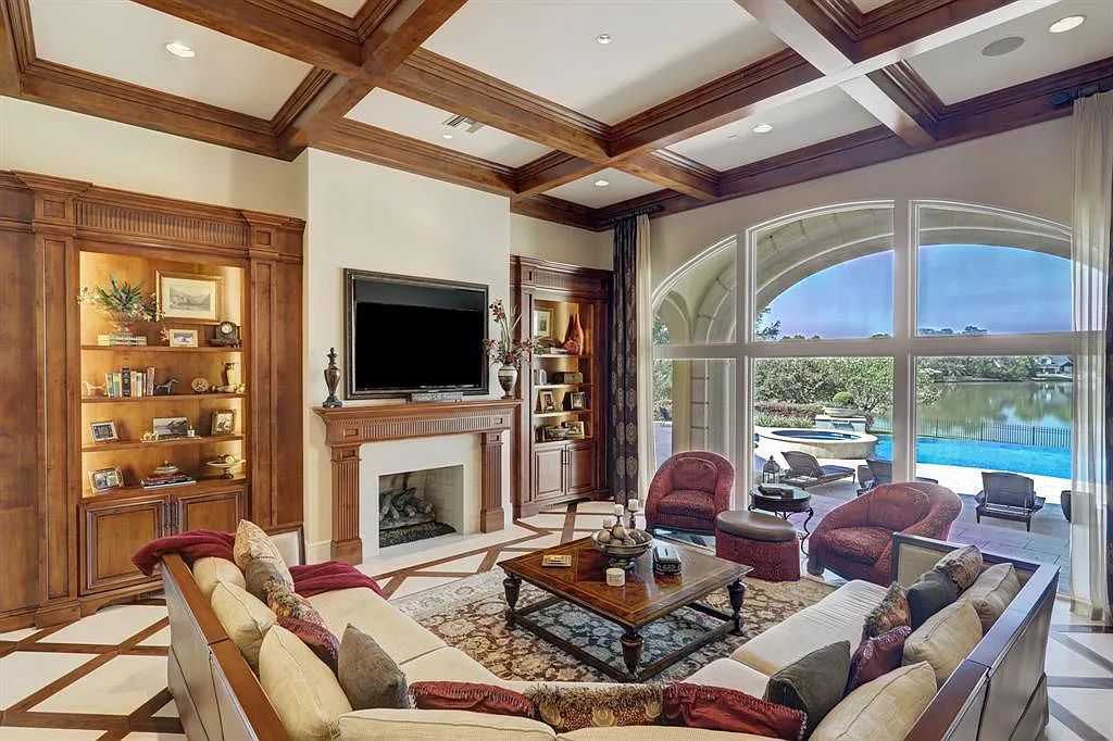 The Home in Sugar Land, a world class architectural masterpiece inspired by Europe's great estates offers endless lifestyle with opulent formals for entertaining, a gorgeous kitchen, wellness gym, two game rooms, wet bars, media room and other entertainment amenities is now available for sale. This home located at 11 Paradise Point Dr, Sugar Land, Texas