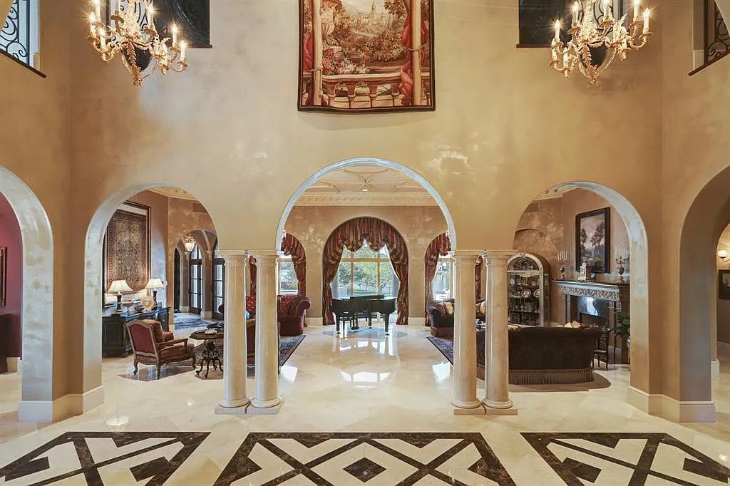The Home in Sugar Land, a world class architectural masterpiece inspired by Europe's great estates offers endless lifestyle with opulent formals for entertaining, a gorgeous kitchen, wellness gym, two game rooms, wet bars, media room and other entertainment amenities is now available for sale. This home located at 11 Paradise Point Dr, Sugar Land, Texas