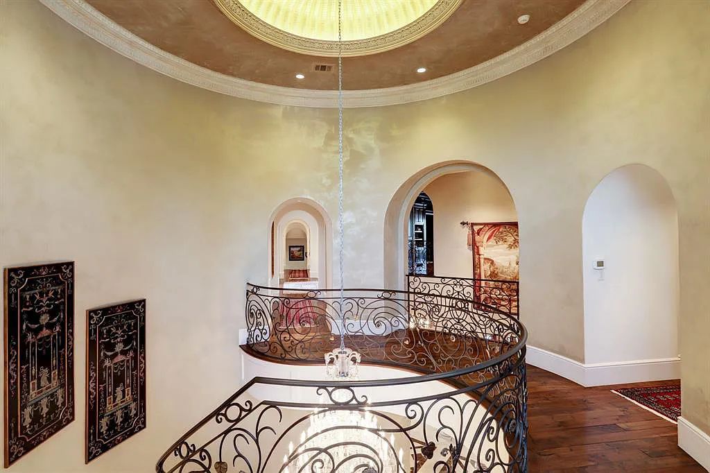The Home in Sugar Land, a world class architectural masterpiece inspired by Europe's great estates offers endless lifestyle with opulent formals for entertaining, a gorgeous kitchen, wellness gym, two game rooms, wet bars, media room and other entertainment amenities is now available for sale. This home located at 11 Paradise Point Dr, Sugar Land, Texas