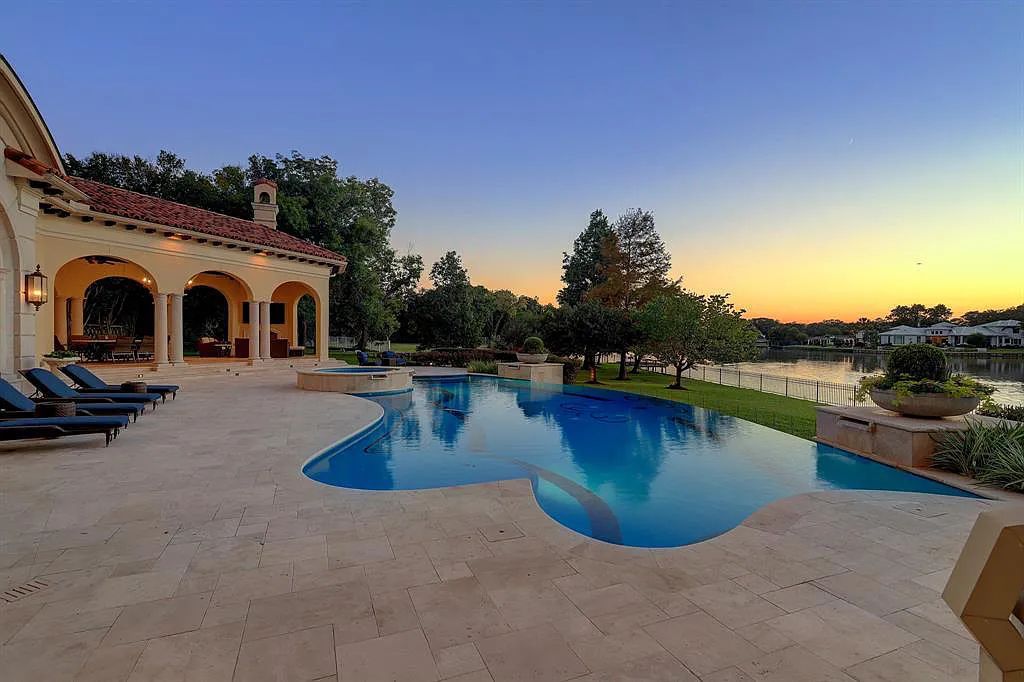 The Home in Sugar Land, a world class architectural masterpiece inspired by Europe's great estates offers endless lifestyle with opulent formals for entertaining, a gorgeous kitchen, wellness gym, two game rooms, wet bars, media room and other entertainment amenities is now available for sale. This home located at 11 Paradise Point Dr, Sugar Land, Texas