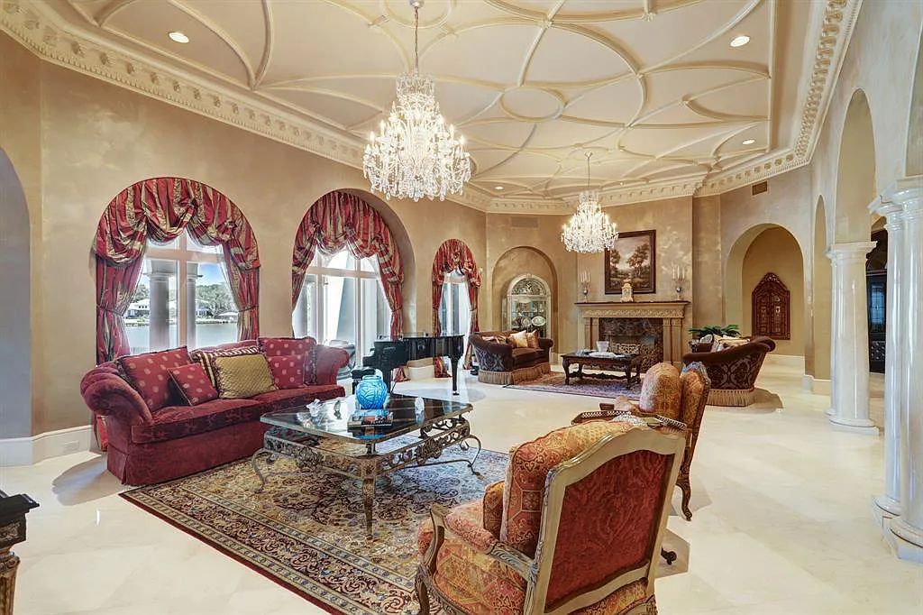 The Home in Sugar Land, a world class architectural masterpiece inspired by Europe's great estates offers endless lifestyle with opulent formals for entertaining, a gorgeous kitchen, wellness gym, two game rooms, wet bars, media room and other entertainment amenities is now available for sale. This home located at 11 Paradise Point Dr, Sugar Land, Texas