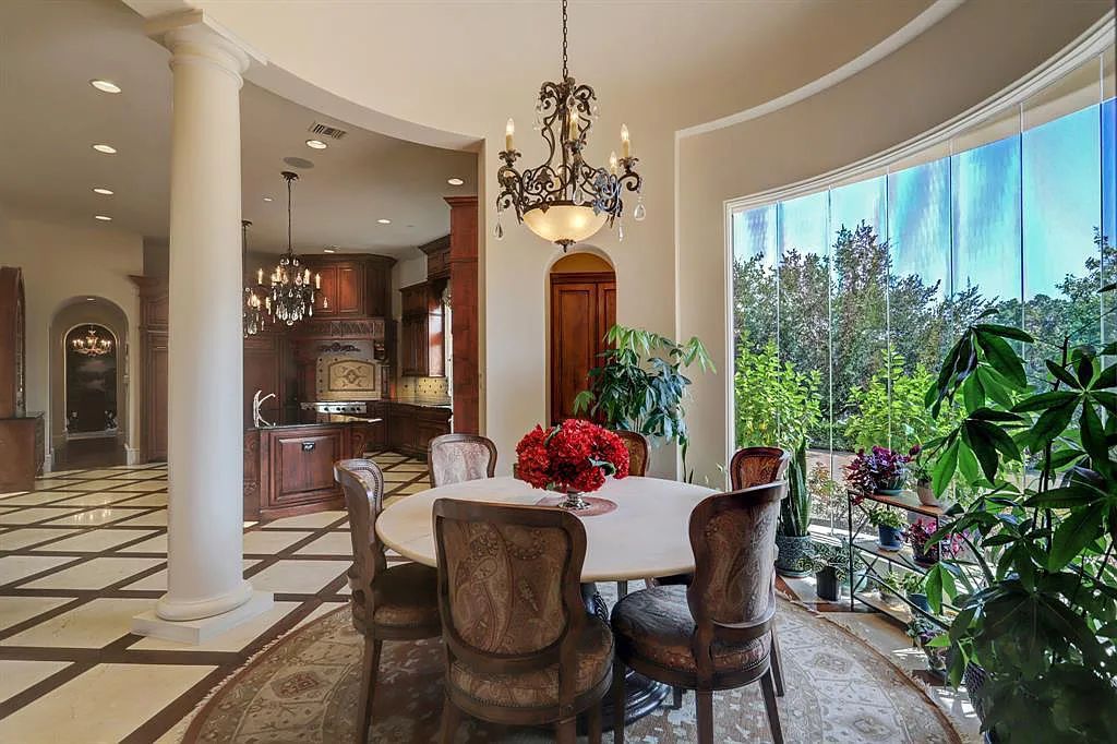 The Home in Sugar Land, a world class architectural masterpiece inspired by Europe's great estates offers endless lifestyle with opulent formals for entertaining, a gorgeous kitchen, wellness gym, two game rooms, wet bars, media room and other entertainment amenities is now available for sale. This home located at 11 Paradise Point Dr, Sugar Land, Texas
