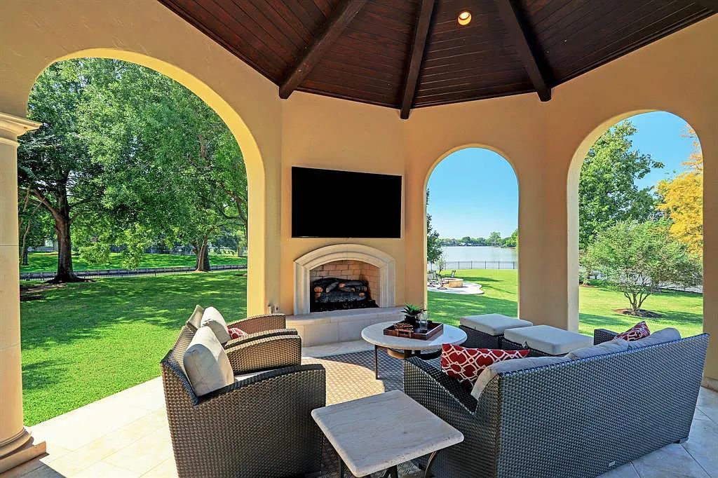 The Home in Sugar Land, a world class architectural masterpiece inspired by Europe's great estates offers endless lifestyle with opulent formals for entertaining, a gorgeous kitchen, wellness gym, two game rooms, wet bars, media room and other entertainment amenities is now available for sale. This home located at 11 Paradise Point Dr, Sugar Land, Texas