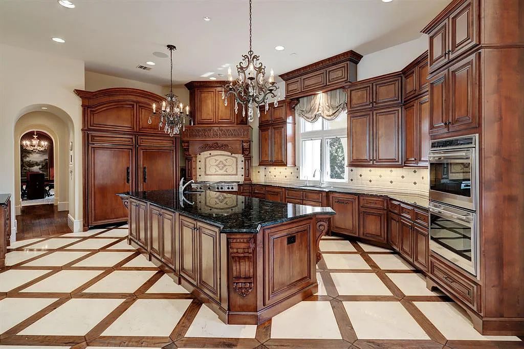 The Home in Sugar Land, a world class architectural masterpiece inspired by Europe's great estates offers endless lifestyle with opulent formals for entertaining, a gorgeous kitchen, wellness gym, two game rooms, wet bars, media room and other entertainment amenities is now available for sale. This home located at 11 Paradise Point Dr, Sugar Land, Texas