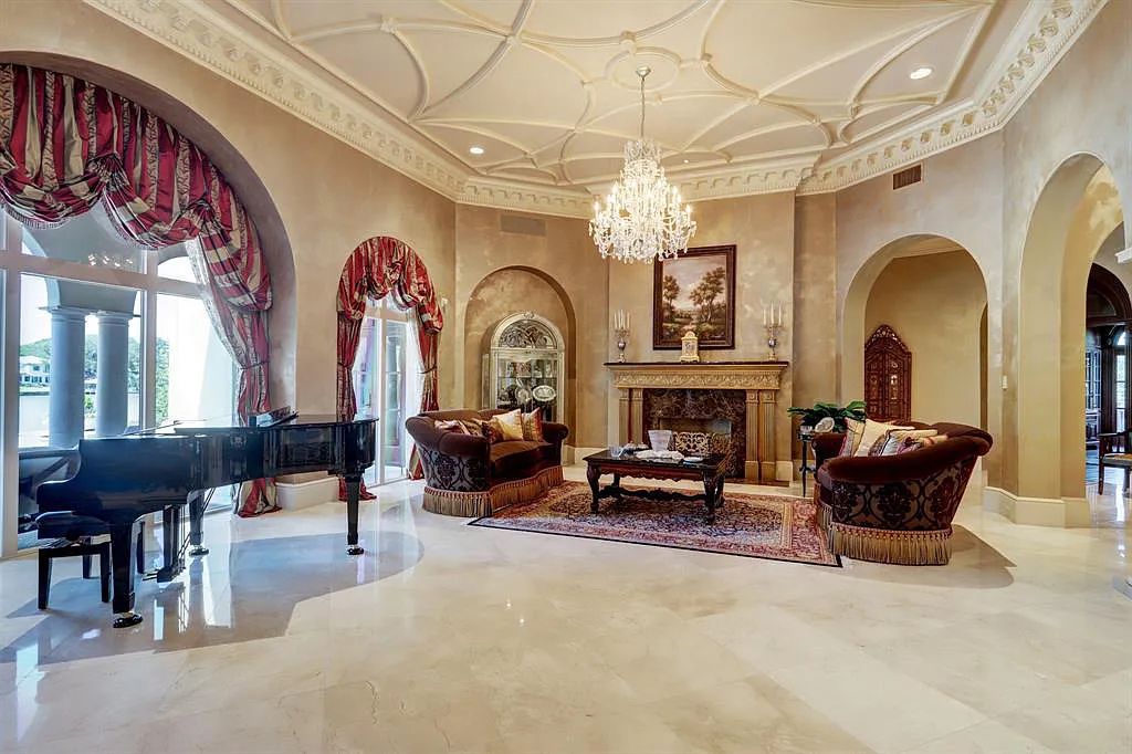 The Home in Sugar Land, a world class architectural masterpiece inspired by Europe's great estates offers endless lifestyle with opulent formals for entertaining, a gorgeous kitchen, wellness gym, two game rooms, wet bars, media room and other entertainment amenities is now available for sale. This home located at 11 Paradise Point Dr, Sugar Land, Texas