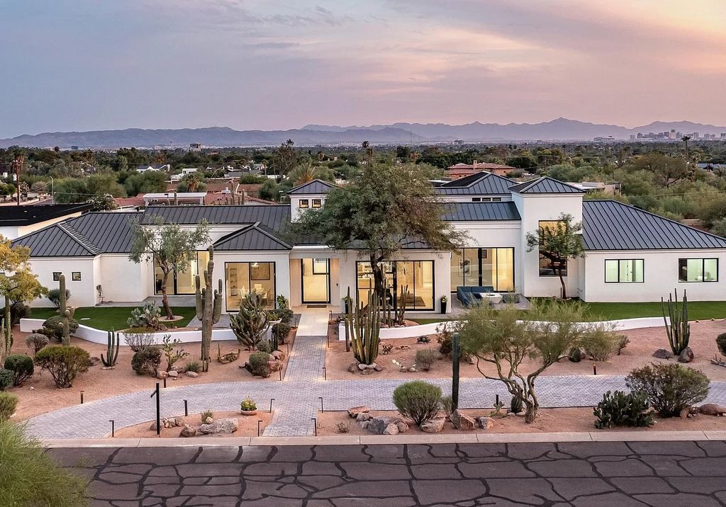 The Home in Phoenix, a magnificent custom remodel home built by Avomos with the lavish backyard entertainment grounds including a cabana and multiple sitting areas is now available for sale. This home located at 4951 E Rockridge Rd, Phoenix, Arizona