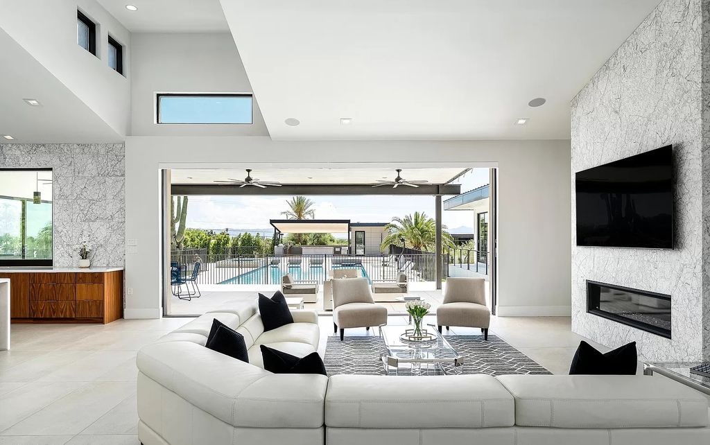 The Home in Phoenix, a magnificent custom remodel home built by Avomos with the lavish backyard entertainment grounds including a cabana and multiple sitting areas is now available for sale. This home located at 4951 E Rockridge Rd, Phoenix, Arizona