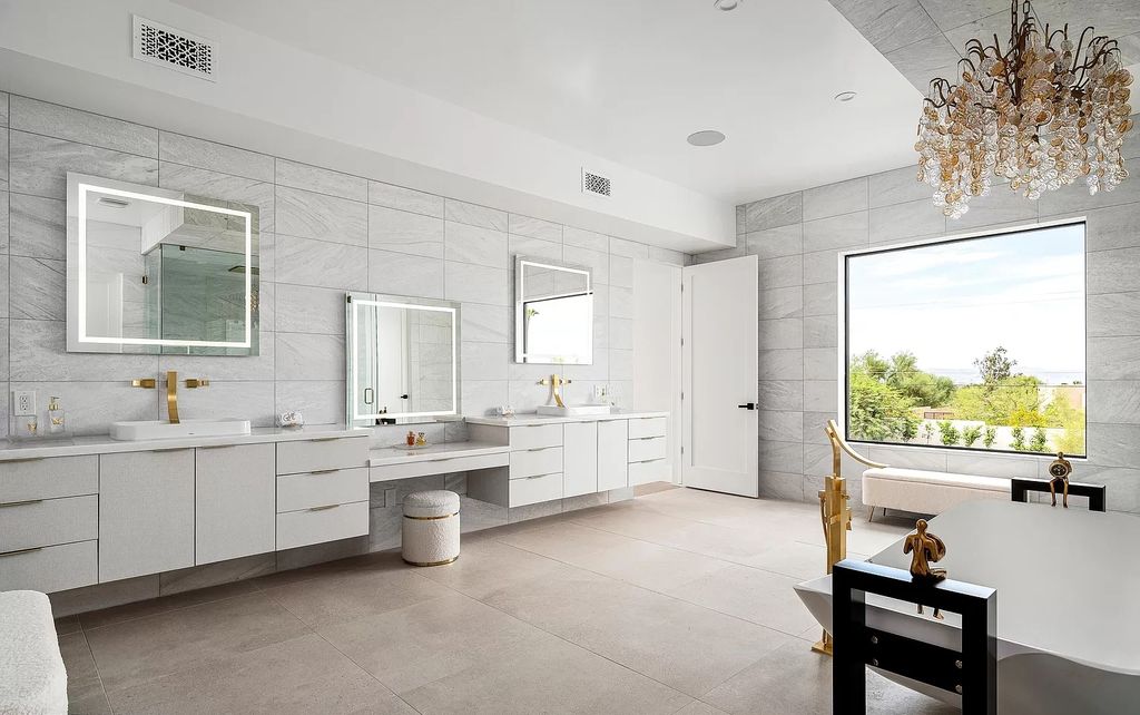The Home in Phoenix, a magnificent custom remodel home built by Avomos with the lavish backyard entertainment grounds including a cabana and multiple sitting areas is now available for sale. This home located at 4951 E Rockridge Rd, Phoenix, Arizona