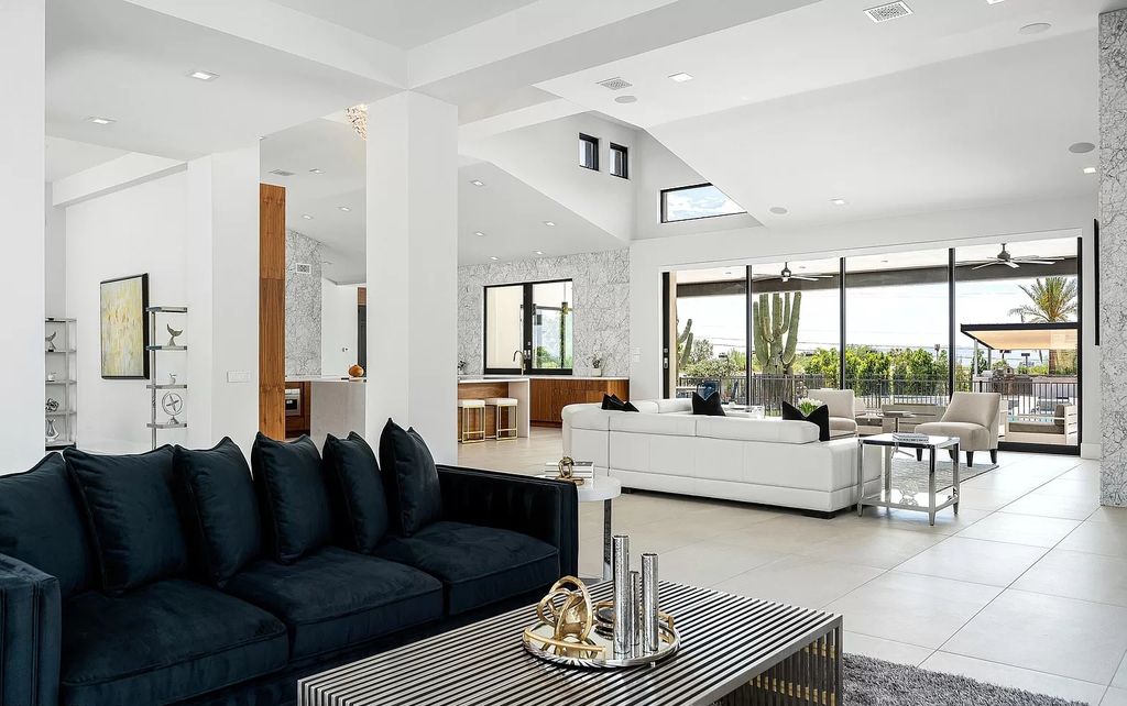 The Home in Phoenix, a magnificent custom remodel home built by Avomos with the lavish backyard entertainment grounds including a cabana and multiple sitting areas is now available for sale. This home located at 4951 E Rockridge Rd, Phoenix, Arizona