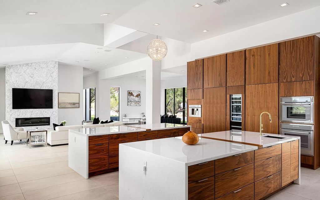 The Home in Phoenix, a magnificent custom remodel home built by Avomos with the lavish backyard entertainment grounds including a cabana and multiple sitting areas is now available for sale. This home located at 4951 E Rockridge Rd, Phoenix, Arizona