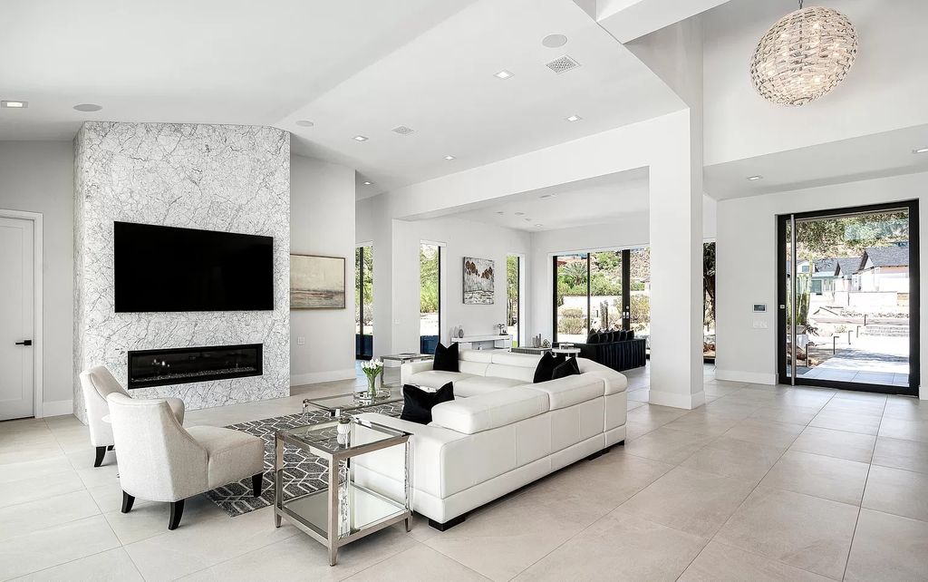 The Home in Phoenix, a magnificent custom remodel home built by Avomos with the lavish backyard entertainment grounds including a cabana and multiple sitting areas is now available for sale. This home located at 4951 E Rockridge Rd, Phoenix, Arizona