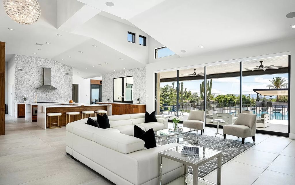 The Home in Phoenix, a magnificent custom remodel home built by Avomos with the lavish backyard entertainment grounds including a cabana and multiple sitting areas is now available for sale. This home located at 4951 E Rockridge Rd, Phoenix, Arizona