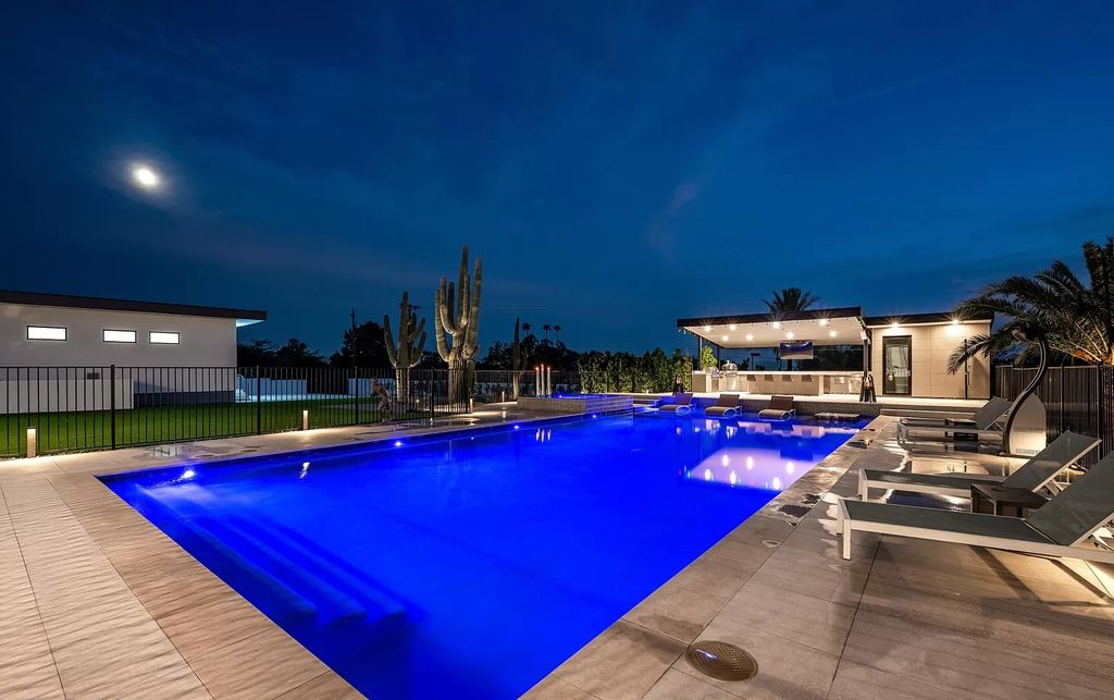 The Home in Phoenix, a magnificent custom remodel home built by Avomos with the lavish backyard entertainment grounds including a cabana and multiple sitting areas is now available for sale. This home located at 4951 E Rockridge Rd, Phoenix, Arizona