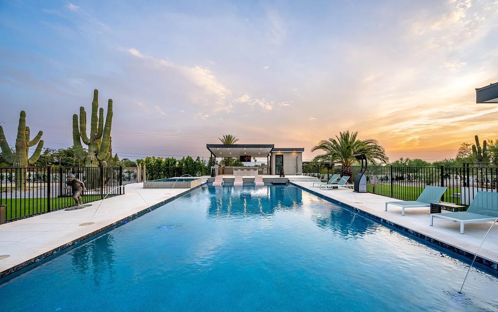 The Home in Phoenix, a magnificent custom remodel home built by Avomos with the lavish backyard entertainment grounds including a cabana and multiple sitting areas is now available for sale. This home located at 4951 E Rockridge Rd, Phoenix, Arizona