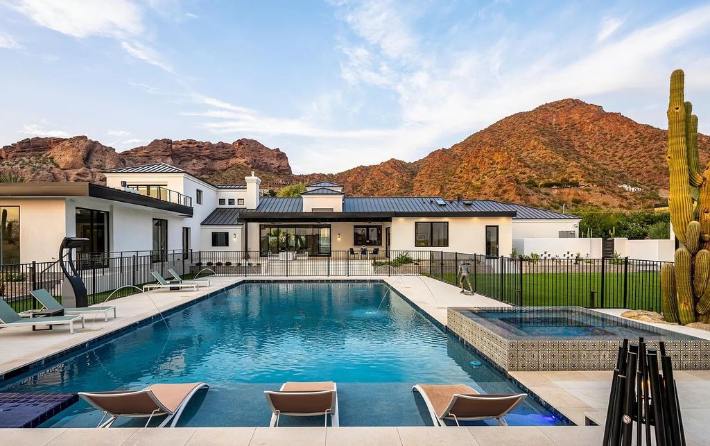 The Home in Phoenix, a magnificent custom remodel home built by Avomos with the lavish backyard entertainment grounds including a cabana and multiple sitting areas is now available for sale. This home located at 4951 E Rockridge Rd, Phoenix, Arizona