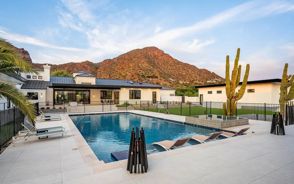 The Home in Phoenix, a magnificent custom remodel home built by Avomos with the lavish backyard entertainment grounds including a cabana and multiple sitting areas is now available for sale. This home located at 4951 E Rockridge Rd, Phoenix, Arizona