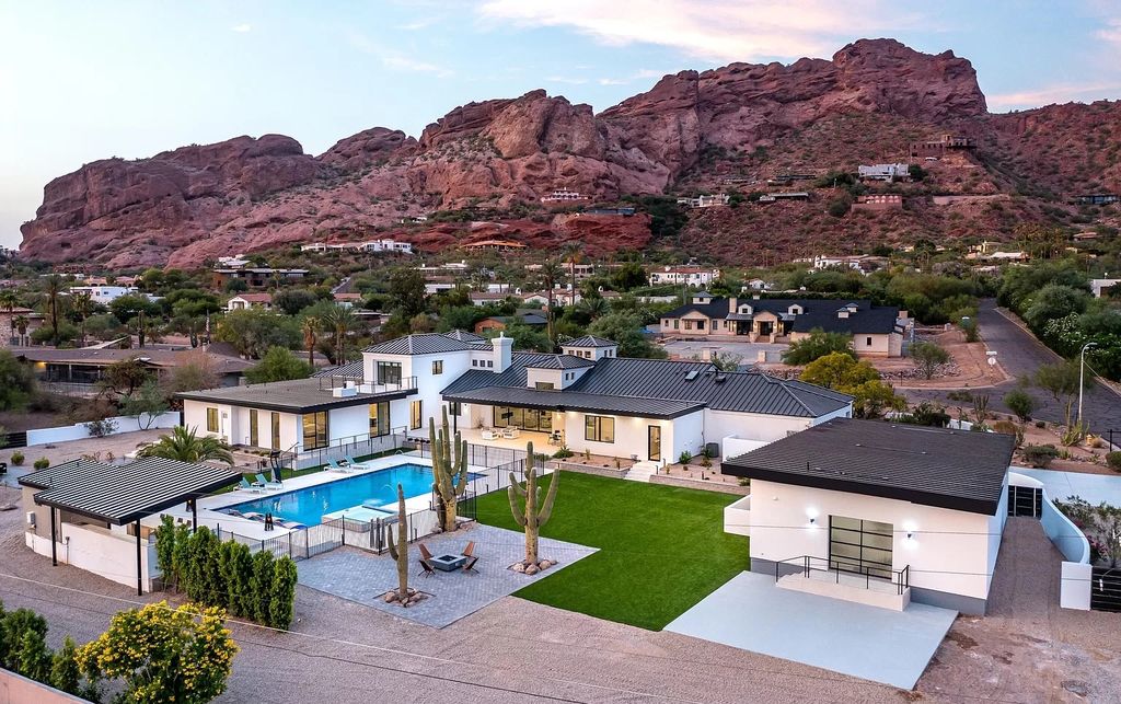 The Home in Phoenix, a magnificent custom remodel home built by Avomos with the lavish backyard entertainment grounds including a cabana and multiple sitting areas is now available for sale. This home located at 4951 E Rockridge Rd, Phoenix, Arizona