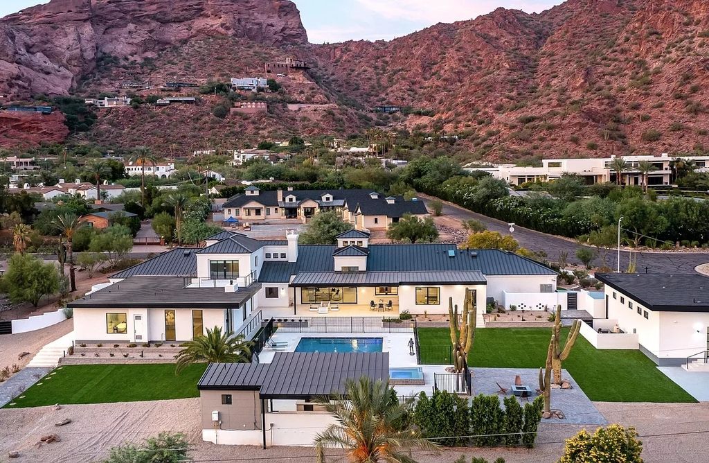The Home in Phoenix, a magnificent custom remodel home built by Avomos with the lavish backyard entertainment grounds including a cabana and multiple sitting areas is now available for sale. This home located at 4951 E Rockridge Rd, Phoenix, Arizona