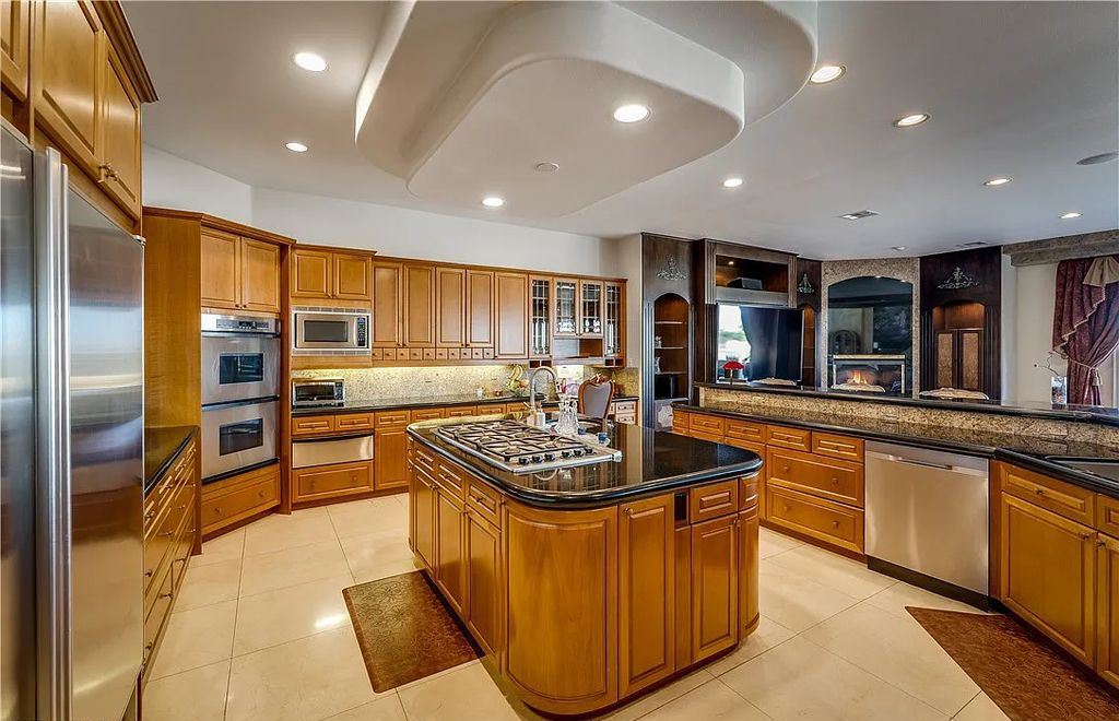 The Home in Henderson, an elegant Terracina estate with classic finishes in a prestigious guard-gated community offers panoramic mountain, sprawling golf course, city, and Strip views is now available for sale. This home located at 2608 Ragusa Ct, Henderson, Nevada